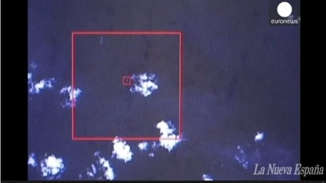 Avista satélite probables restos de avión malasio desaparecido